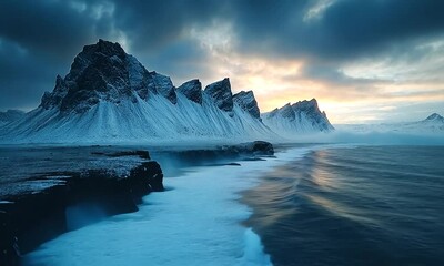 Wall Mural - Majestic icy mountains by the sea at sunset.