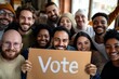 © ChaoticMind - A diverse group of smiling people enthusiastically hold up a sign that says 'Vote', promoting civic engagement and community involvement in a positive atmosphere.