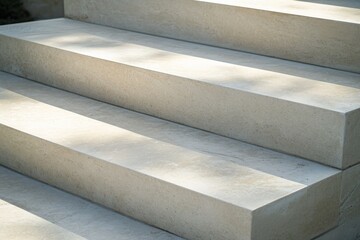 Leinwandbilder - A detailed close-up shot of stone steps, emphasizing the smooth and textured surfaces under soft lighting, creating an inviting and serene atmosphere.