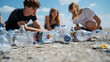 © HQAsset - Group of People Cleaning Up Plastic Water Bottles on Beach