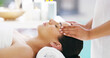 © peopleimages.com - Woman, facial and hands with masseuse for massage, spa treatment or relaxation at luxury resort. Closeup, female person or therapist with client for lymphatic drainage, stress relief or zen at salon