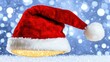 © Akael - Festive Red Santa Hat on a Shimmering Background with Snowflakes and Bokeh Lights, Perfect for Holiday Decorations and Christmas Celebrations