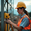 © Родион Бондаренко - female contractor standing with theodolite or level at construction site