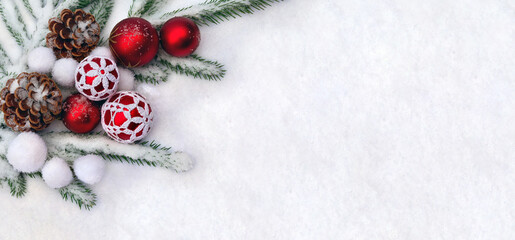 Wall Mural - christmas decoration. christmas red ball knitted with white threads, cone pine and christmas tree in