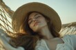 © Vladimir - A Thai summer beach scene: an Asian woman traveler relaxing in a hammock