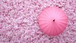 © kvladimirv - Pink Umbrella on Floral Background: Aesthetic Spring Blossom Scene for Modern Design