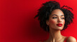 © Inspire Shots Hub - Elegant woman with curly hair poses against a bold red background showcasing confidence and beauty