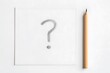 © A2Z AI  - Close-up of a pencil-drawn question mark symbol, showcasing a hand-sketched design with textured lines, representing curiosity, inquiry, or problem-solving
