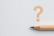 © A2Z AI  - Close-up of a pencil-drawn question mark symbol, showcasing a hand-sketched design with textured lines, representing curiosity, inquiry, or problem-solving