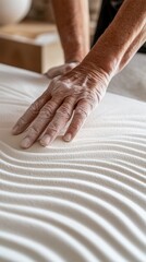 Wall Mural - Hand gently touches a textured surface, creating soothing ripples, AI