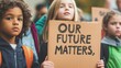 © Sam - Young children holding a sign at a protest, highlighting their hopes for a better future.