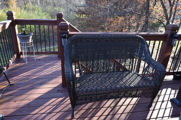 Canvas Print - Wicker Bench on a Deck