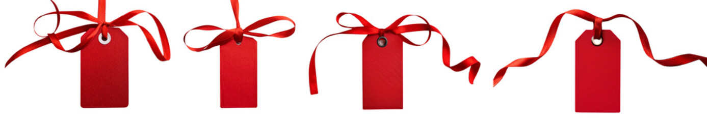 Four red gift tags with ribbons, isolated on white background.