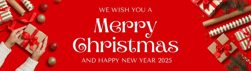 Wall Mural - Merry Christmas, gift boxes, hands and decorations on red background with text