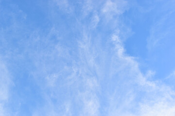 Wall Mural - beautiful blue sky and white fluffy group of clouds with sunrise in the morning, natural background