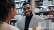 © mariiaplo - Smiling Young Man Having a Conversation at a Cosmetics Store