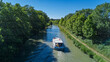 © Iuliia Sokolovska - Vacation boat in Canal du Midi, family travel cruise by barge penichette, holidays in Southern France