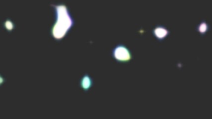 Wall Mural - a black background with a bright light in the middle. the light is surrounded by a bunch of stars