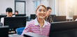 © Bettencourt/peopleimages.com - Portrait, woman and business people with computer, internet and smile with connection. Japan, employees and group with consultant, tech or email with website information, happiness or career ambition