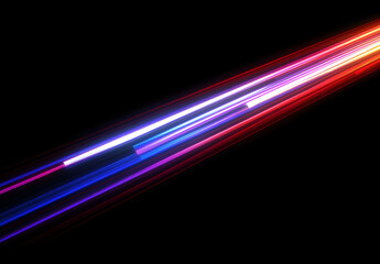 Wall Mural - A vibrant light beam with multiple colors of red, blue, and purple against a black background.
