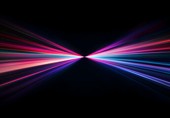 Wall Mural - A vibrant light beam with multiple colors of red, blue, and purple against a black background.