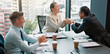 © peopleimages.com - Handshake, client and people in boardroom, celebration and negotiation for business deal and talking. Office, shaking hands and group with paperwork for proposal, excited and sales manager in Japan
