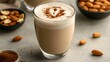 © Farn - 92. A creamy almond milk latte with latte art and almond garnish