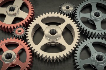 Aufkleber - Interlocking gears rotating smoothly on dark background