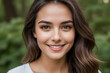 © samsulalam - Beautiful smiling woman with long brown hair showing perfect white teeth in nature