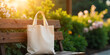 © Anuyj - Eco-friendly shopping bag made from cotton or mesh against a backdrop of vibrant green grass. Embracing zero waste and eliminating plastic use. Concept of sustainable shopping and recycling.