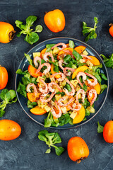 Wall Mural - Fresh persimmon seafood salad.