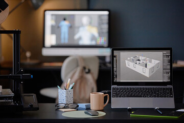 Leinwandbilder - Office desk setup with laptop showing architectural designs and screens in background depicting digital modeling creating focused atmosphere enhancing productivity