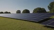 © Saud - Solar panels installed in a green field under a clear blue sky during daylight hours in an environmentally friendly initiative