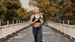 © peopleimages.com - Woman, running and thinking on health in town, fitness and outdoor nature for dream of weight goals. Female person, urban park and reflection on exercise results, bottle and cardio workout in Japan