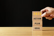 © sichon - 2025 GOAL PLAN ACTION. start up business. new year. Put last piece of wooden cube with the letters 2025. Steps required to achieve the goal