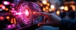 © TUN - A futuristic scene of a hand interacting with a glowing holographic interface, emitting vibrant lights in a blurred, colorful environment.