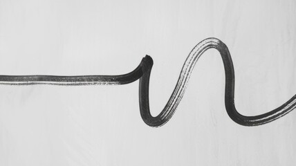 Wall Mural - abstract black ink stroke. elegant flowing ink design; symbolizes journey, growth, or creative freed