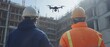 © Panuwat - Two construction workers wearing hard hats high visibility A medical specialist pilots