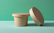 © Prasanth - Eco cardboard round food box on table, mint green background