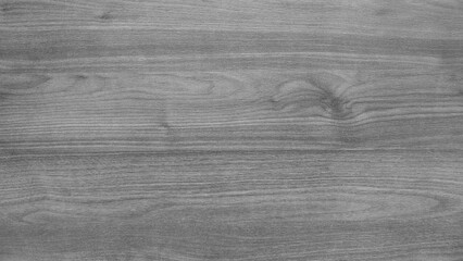 Poster - A wooden surface with a grainy texture. The wood is grey and has a natural look. The surface is smooth and has no visible blemishes