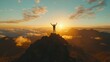 © shooreeq - A dramatic image of a single person reaching the summit of a mountain during sunrise, arms raised in triumph