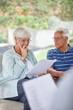 © peopleimages.com - Elderly couple, thinking and documents with financial advisor for retirement plan, pension fund or assets at home. Senior, man or woman with paperwork or consultant for insurance or retired annuity