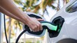 © Zilvinas - Electric car, charging station, technology, sustainability, eco-friendly, clean energy, automobile, vehicle, ev, plugin, power, outlet, energy consumption, environment, green transportation