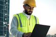 © Dash - Portrait of a Saudi Arabian Gulf architect wearing a work hat and protective suit, standing with hands, standing firm and strong, self-confidence and psychological comfort, white background