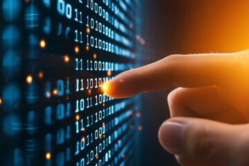 close-up of hand touching digital binary code display with orange light