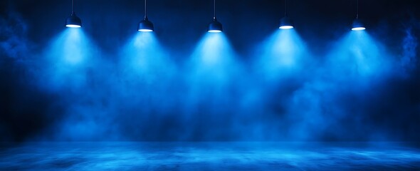 Fototapete - A dimly lit stage with blue spotlights illuminating a misty atmosphere, creating a dramatic and moody ambiance.