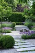 © KerXing - A stunning garden featuring a stone pathway, vibrant purple flowers, and lush greenery, creating a peaceful and modern outdoor space.
