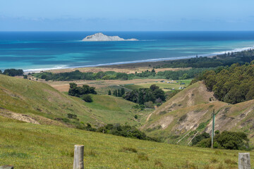 Wall Mural - Rural landscape with view across land to coast and Bare Island