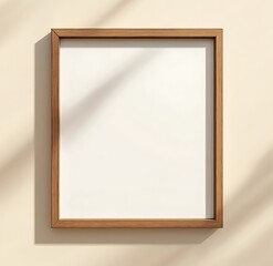 Poster - A simple wooden frame with a blank, white interior, casting soft shadows on a light background, ideal for displaying artwork or photographs.