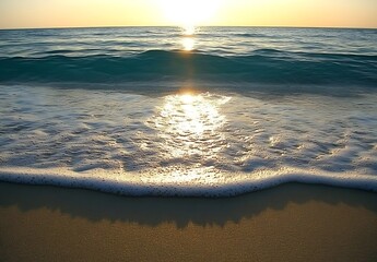 Aufkleber - A serene sunset over gentle ocean waves, with sparkling sunlight reflecting on the water and soft foam lapping at the sandy shore.